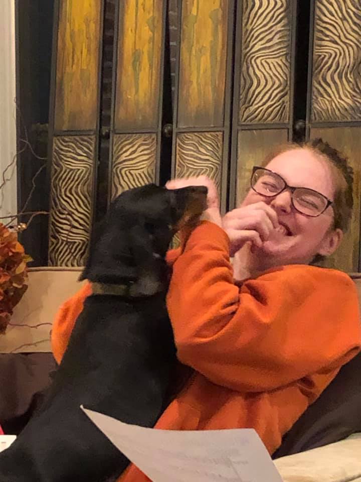 photo of Madeleine Mcgregor and puppy at soprano sectional